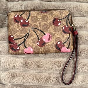 Like new Coach Brown and Red Cherry Wristlet